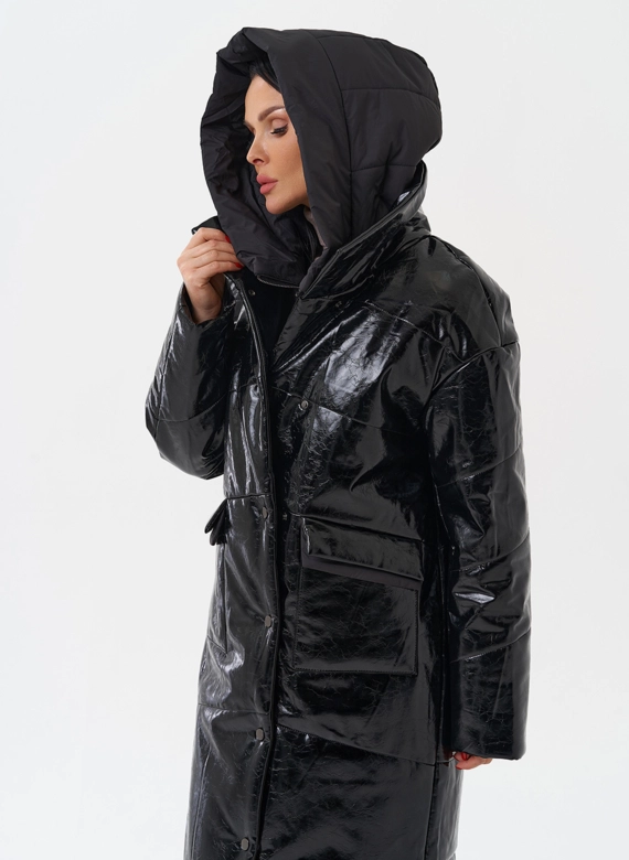 Женский пуховик из эко кожи с капюшоном