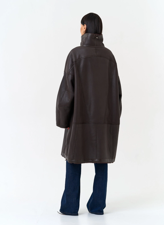 Женская дубленка из натурального меха фото